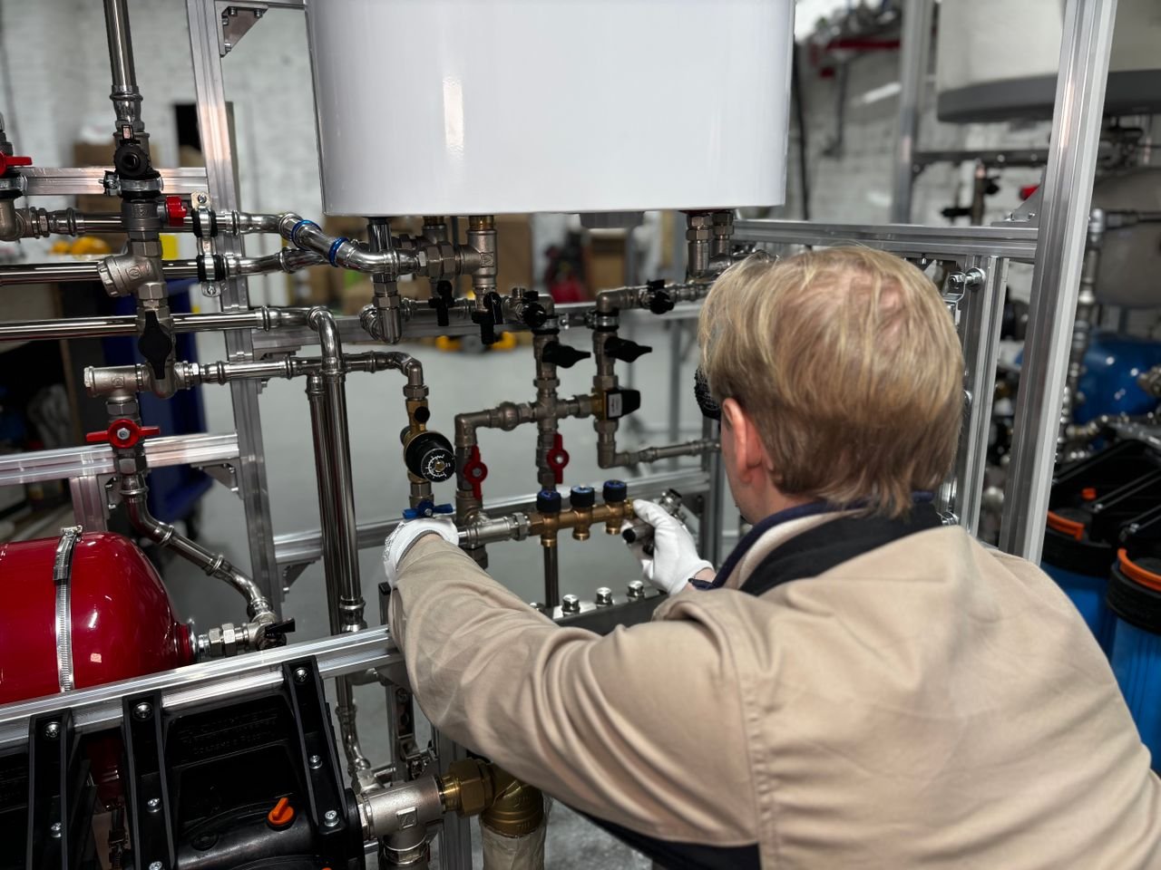 The Art of Drawing Readers In: Your attractive post title goes here Engineer working on industrial pipe system in a factory for heating and production adjustment.